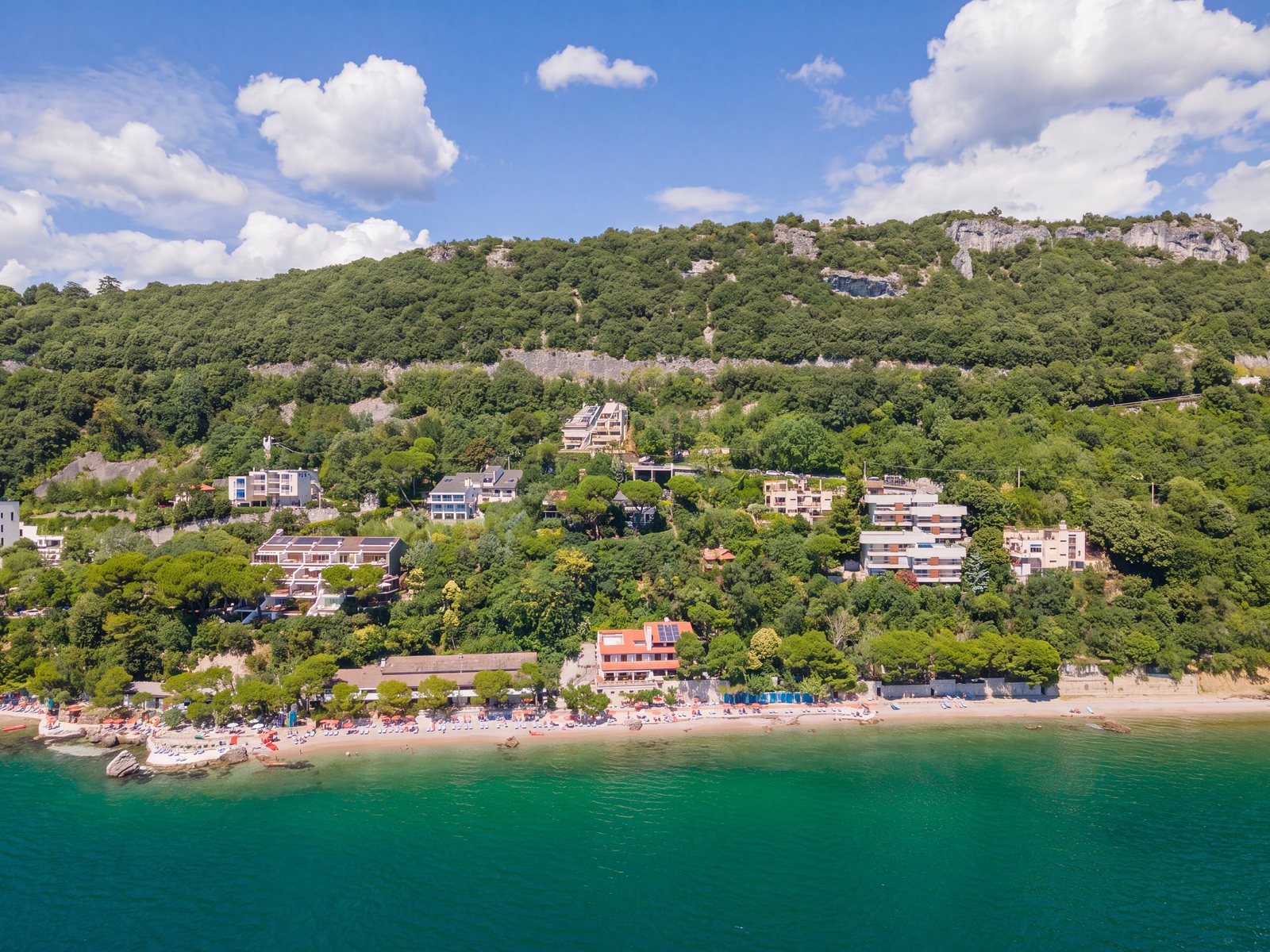 Aerial view of the coast and the pebble beach below the villa, Aurisina Mare